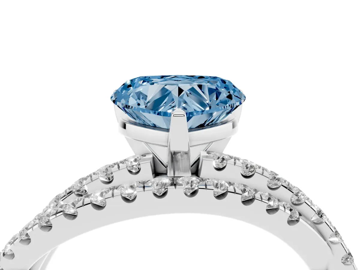 Fancy Blue Heart Cut Solitaire Twist Band with Pavé Setting and Four-Prong Setting Silver