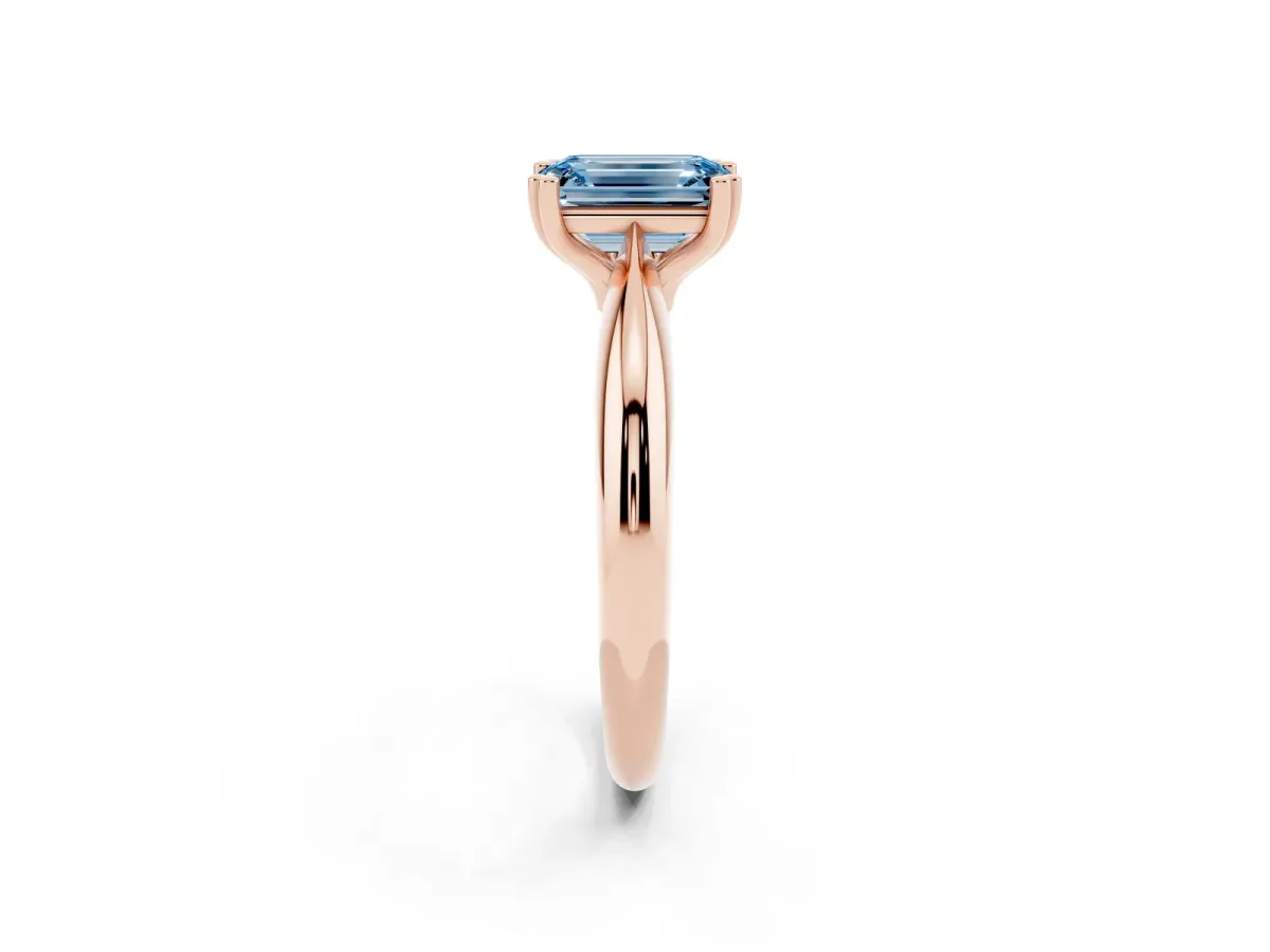 Fancy Blue Emerald Cut Cut Solitaire Engagement Ring with Tapered Band and Four-Prong Setting Rose gold
