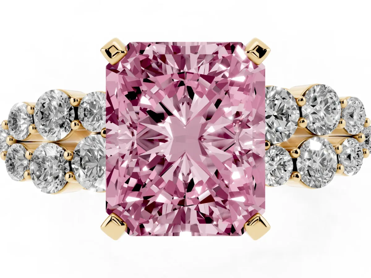 Fancy Pink Radiant Cut Cluster Diamond Engagement Ring with Pavé Band and Four-Prong Setting Yellow gold