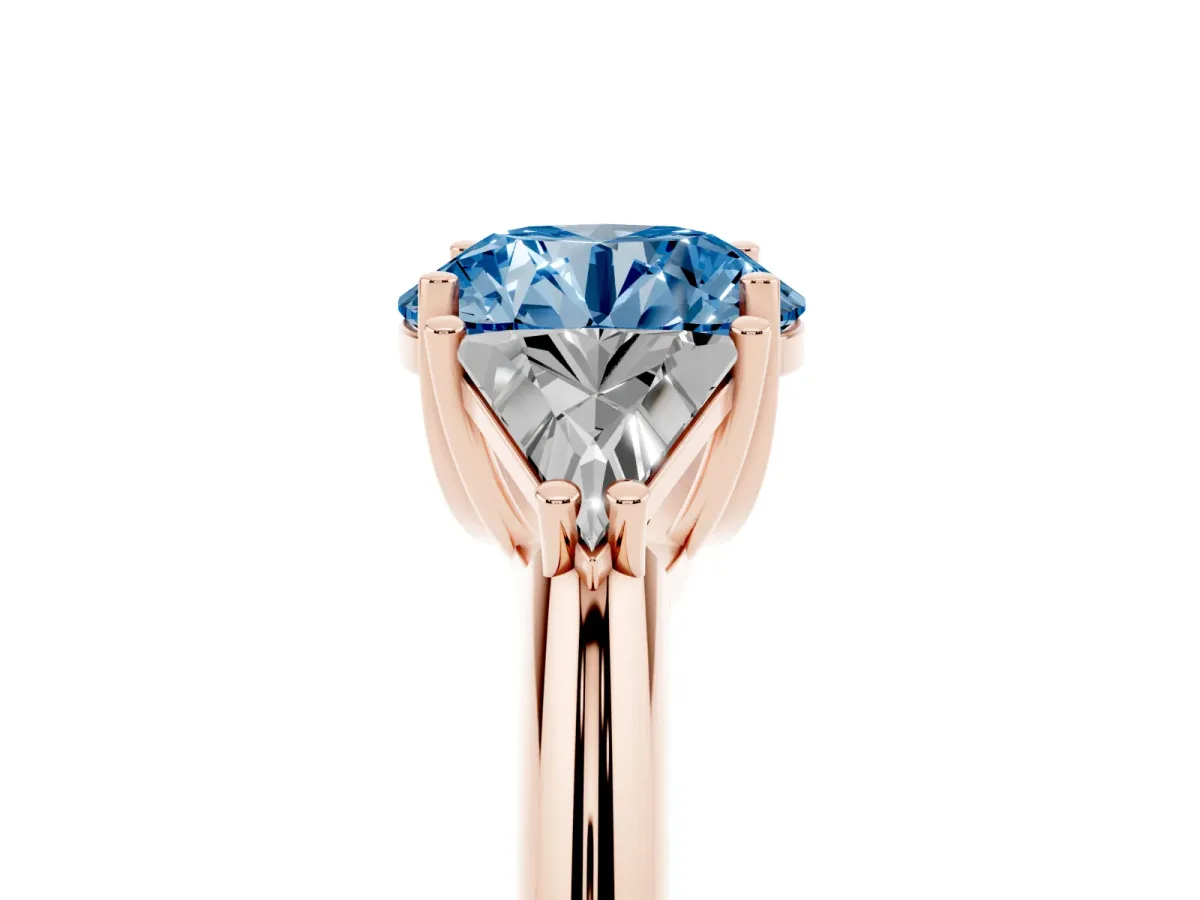 Fancy Blue Three-Stone Round Cut Diamond Engagement Ring with Trillion Side Stones and Prong Setting Rose gold
