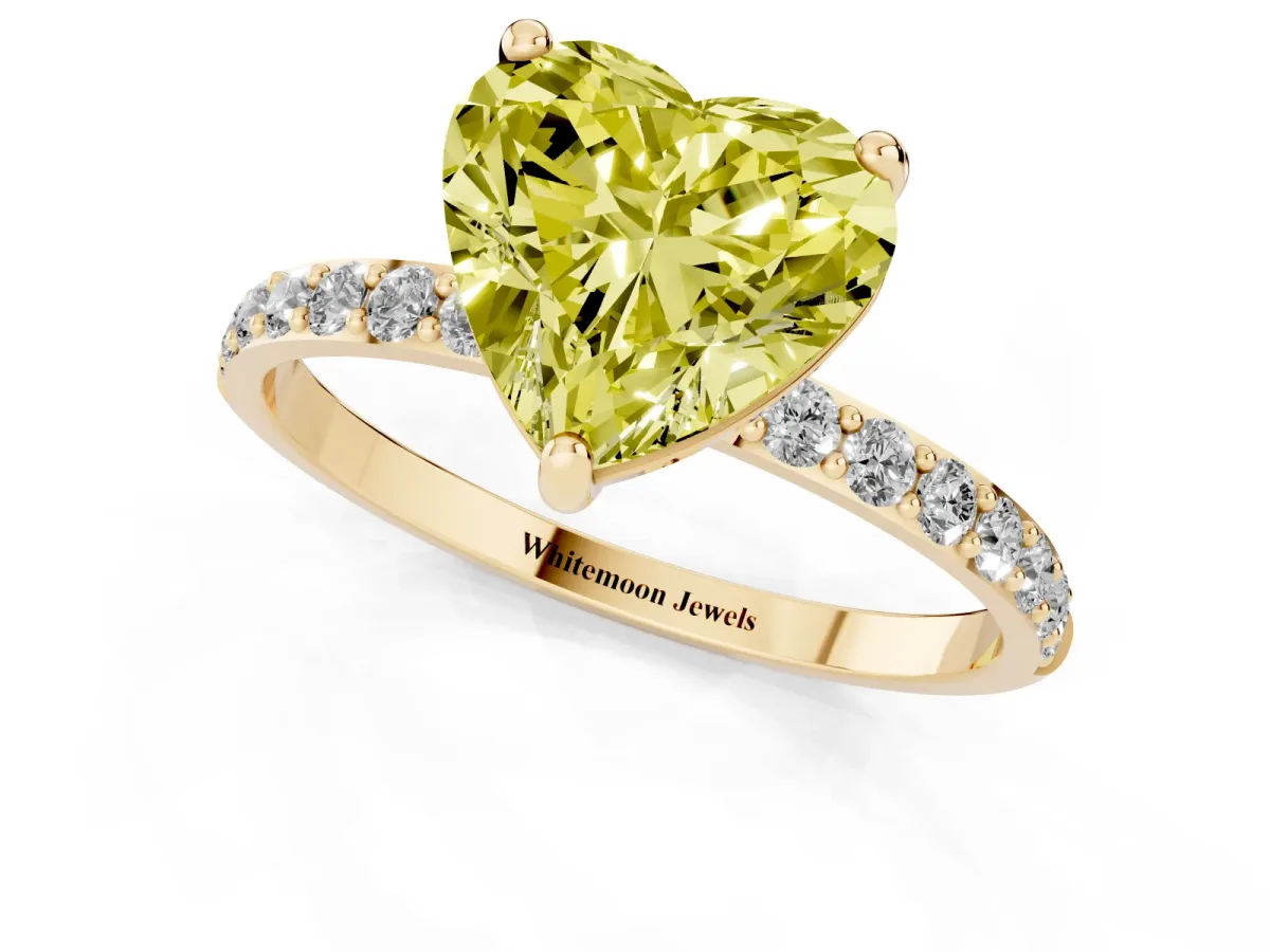 Fancy Yellow Heart Cut Diamond Solitaire Ring with Round Pavé Band and Prong Setting Yellow gold