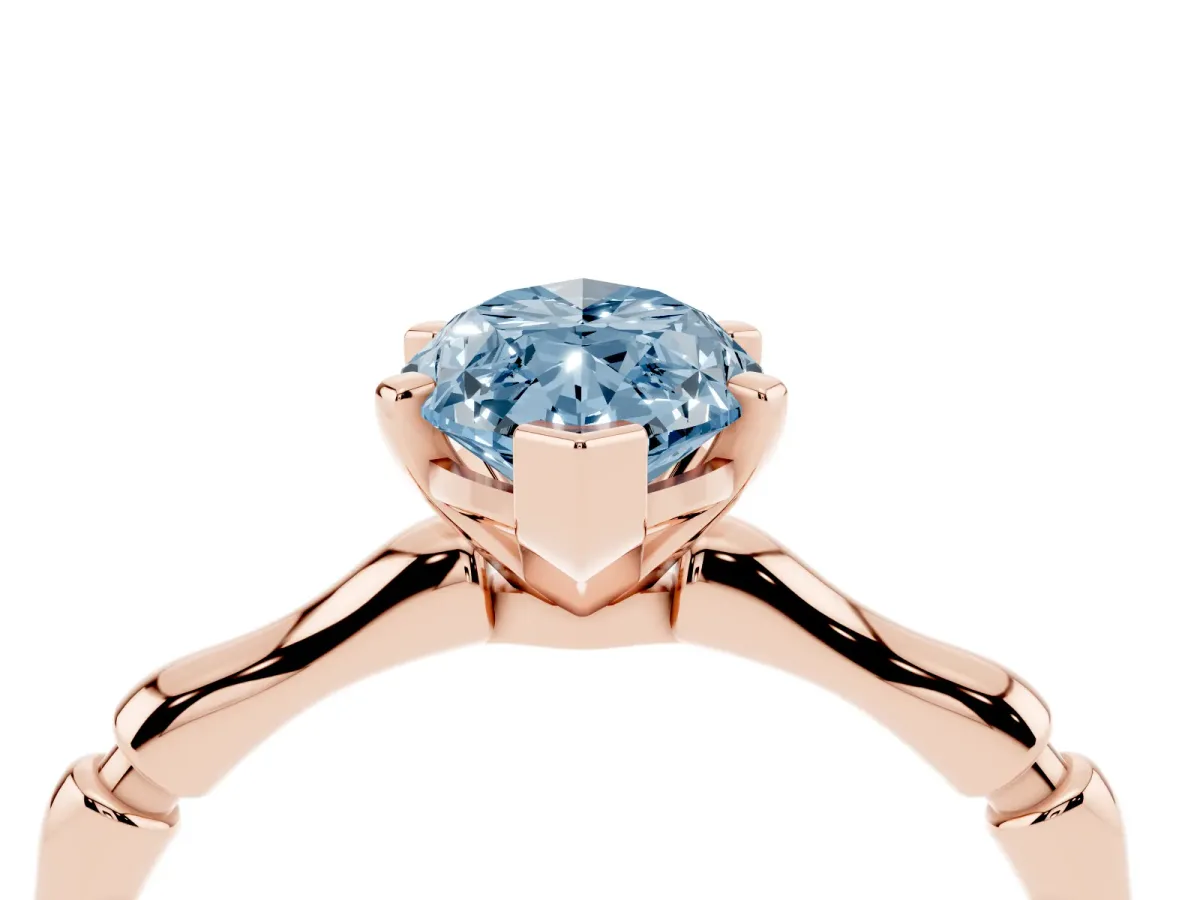 Fancy Blue Marquise Cut Solitaire Diamond Ring with Bamboo Band and Four-Prong Setting Rose gold