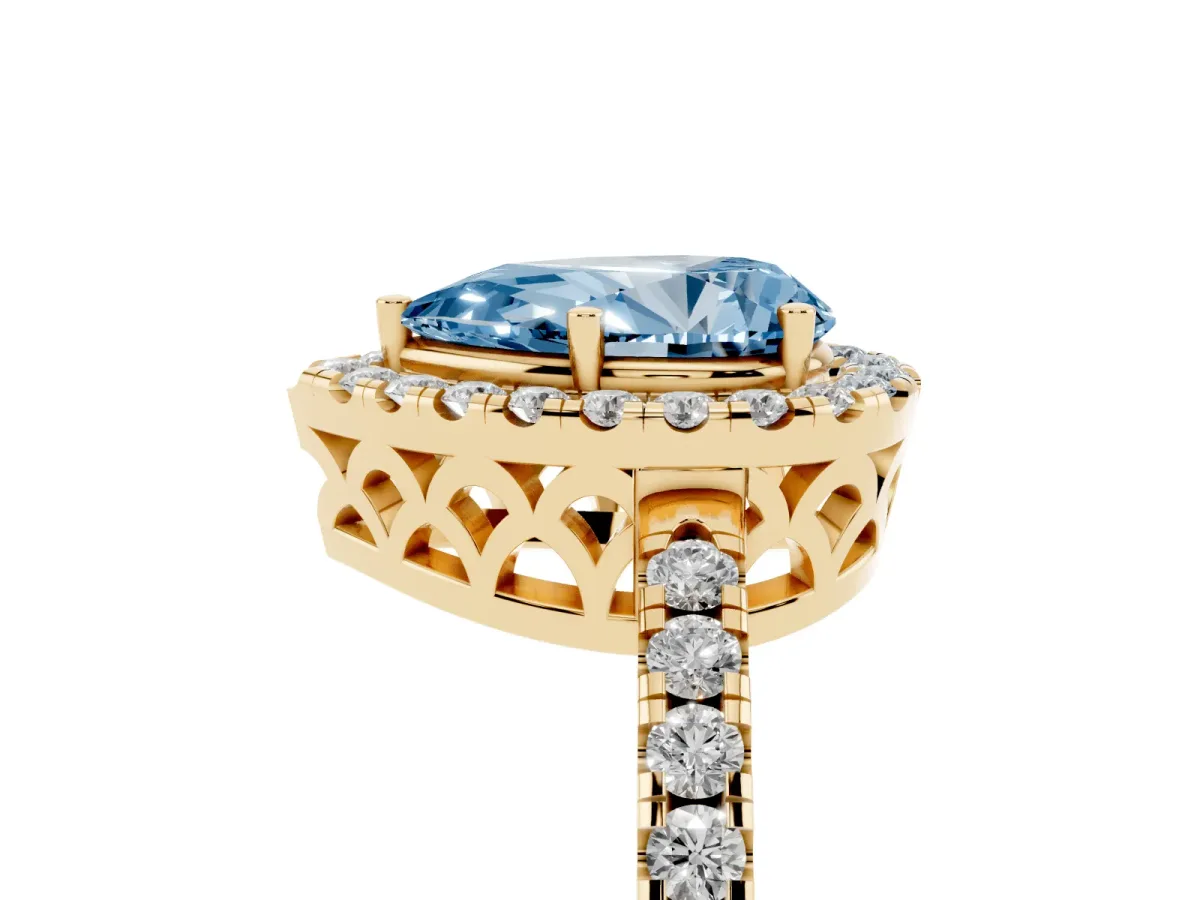 Fancy Blue Pear Cut Halo Diamond Engagement Ring with Pavé Band and Four-Prong Setting Yellow gold