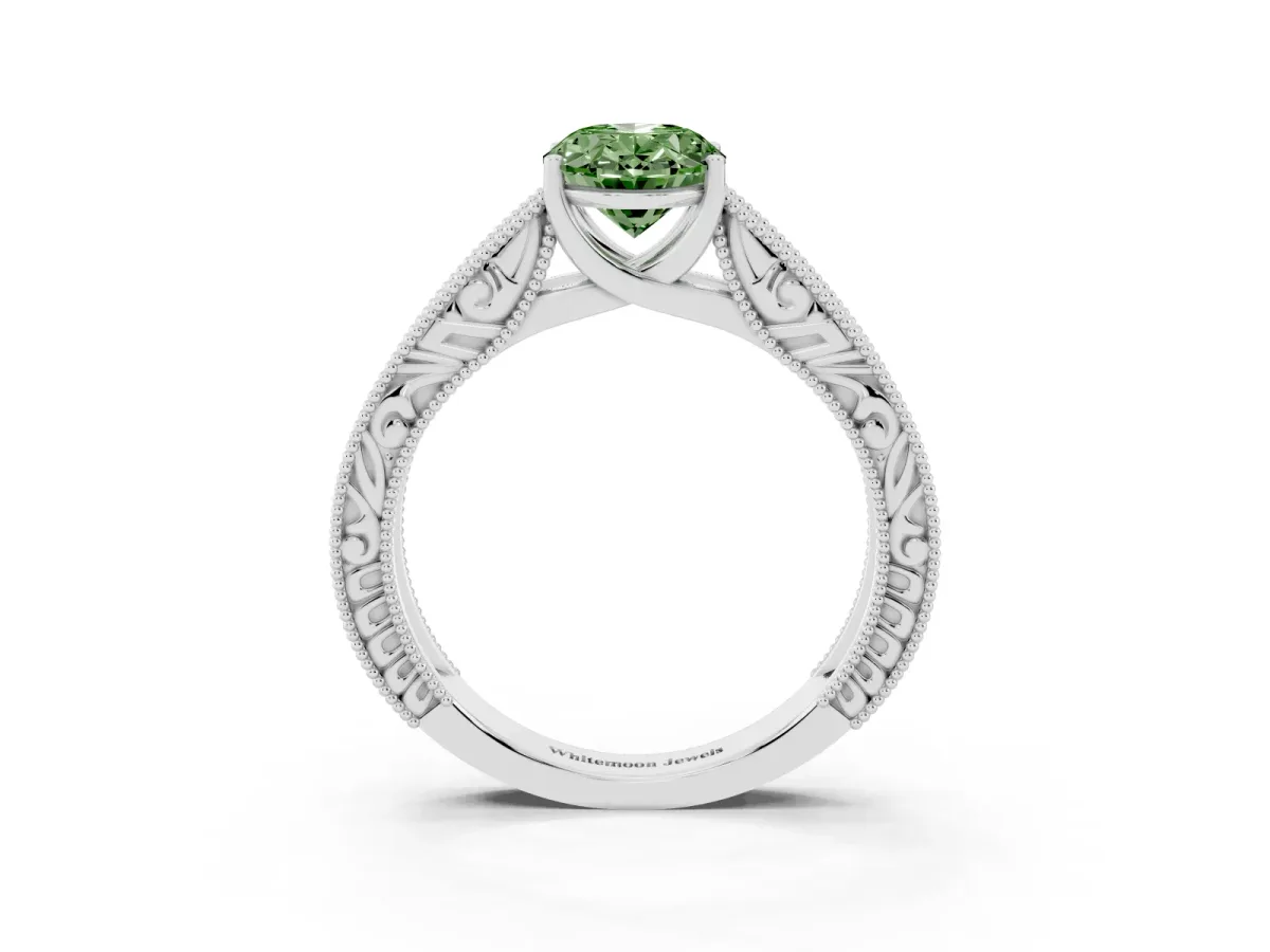 Fancy Green Oval Cut Diamond Solitaire Ring with Engraved Band and Four-Prong Setting Platinum