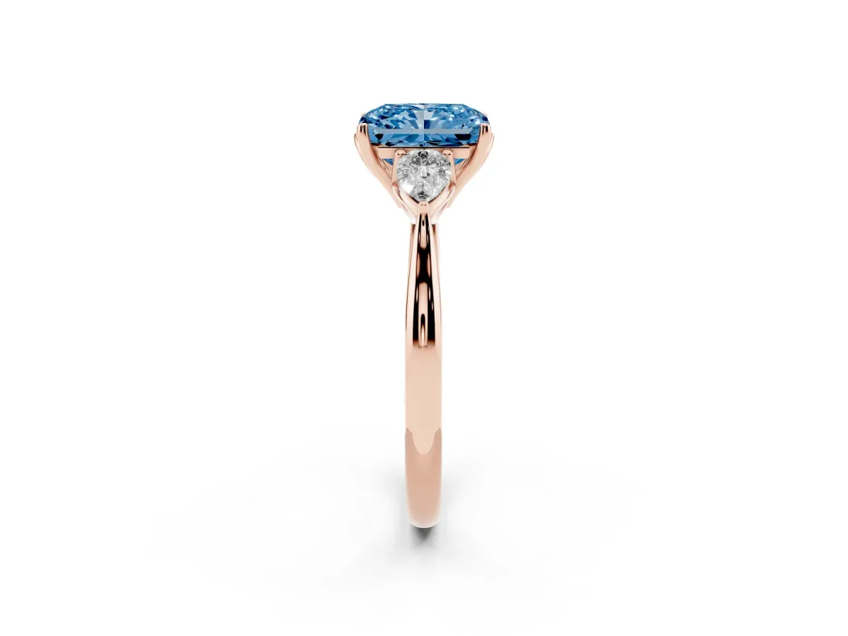 Fancy Blue Radiant Cut Diamond Three-Stone Ring with Pear Side Stones and Prong Setting Rose gold
