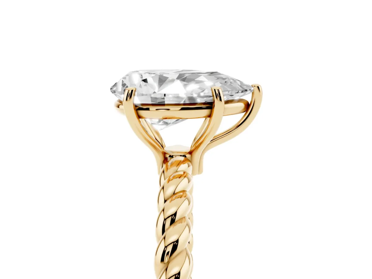 Pear Cut Solitaire Twist Band Ring with Four-Prong Setting Yellow gold
