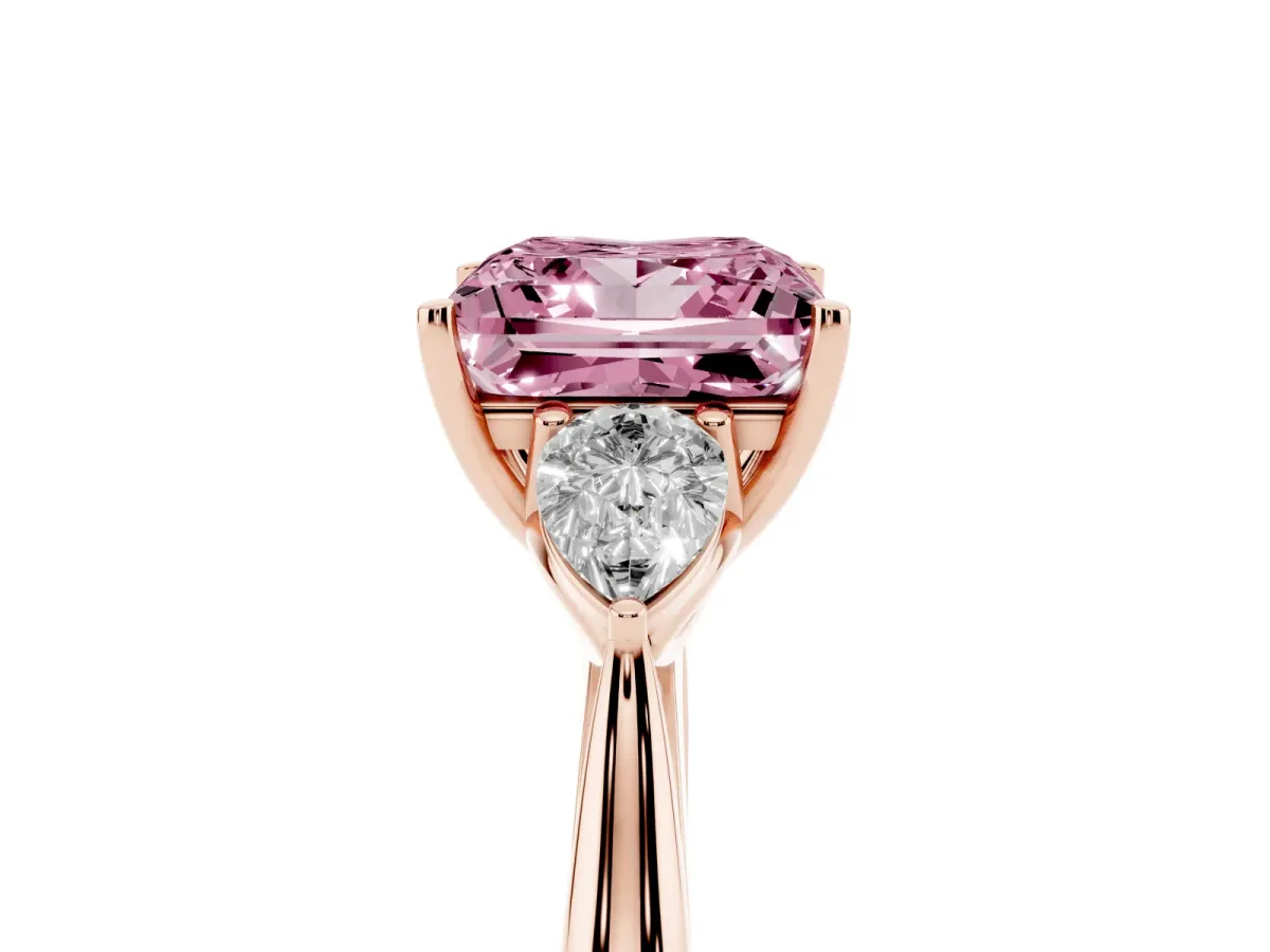 Fancy Pink Three-Stone Princess Cut Diamond Ring with Pear Side Stones in Four-Prong Setting Rose gold