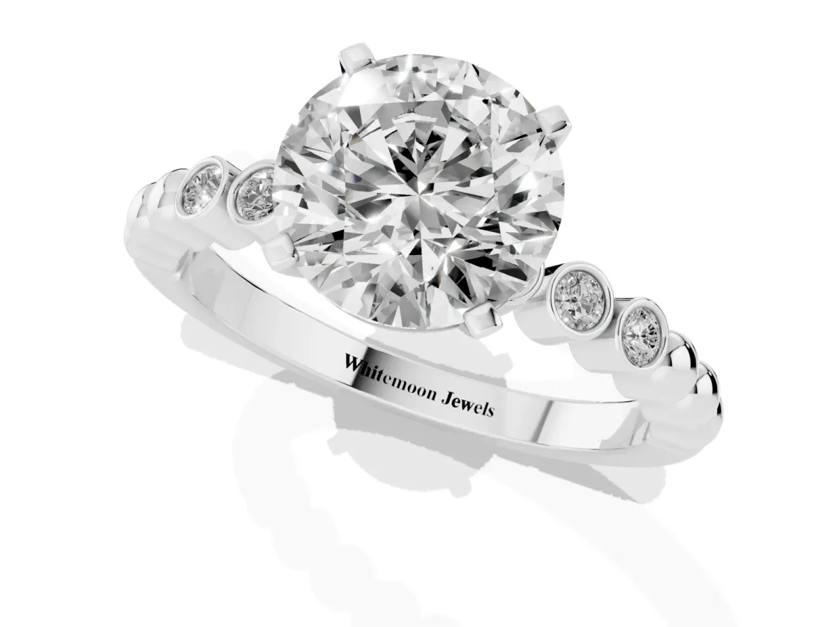Round Cut Solitaire Bezel Accent Diamond Engagement Ring with Beaded Band and Four-Prong Setting Silver