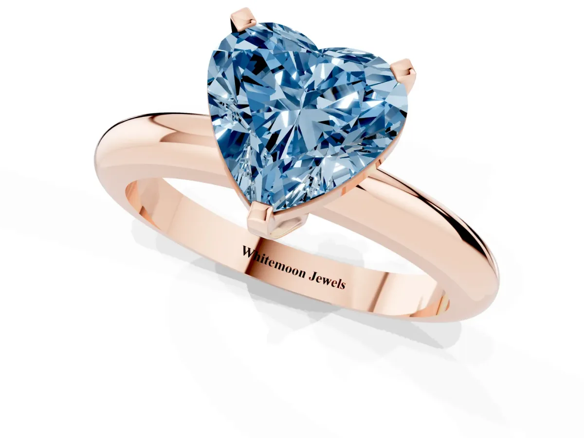 Fancy Blue Heart Cut Diamond Solitaire Engagement Ring with Round Band and Four-Prong Setting Rose gold