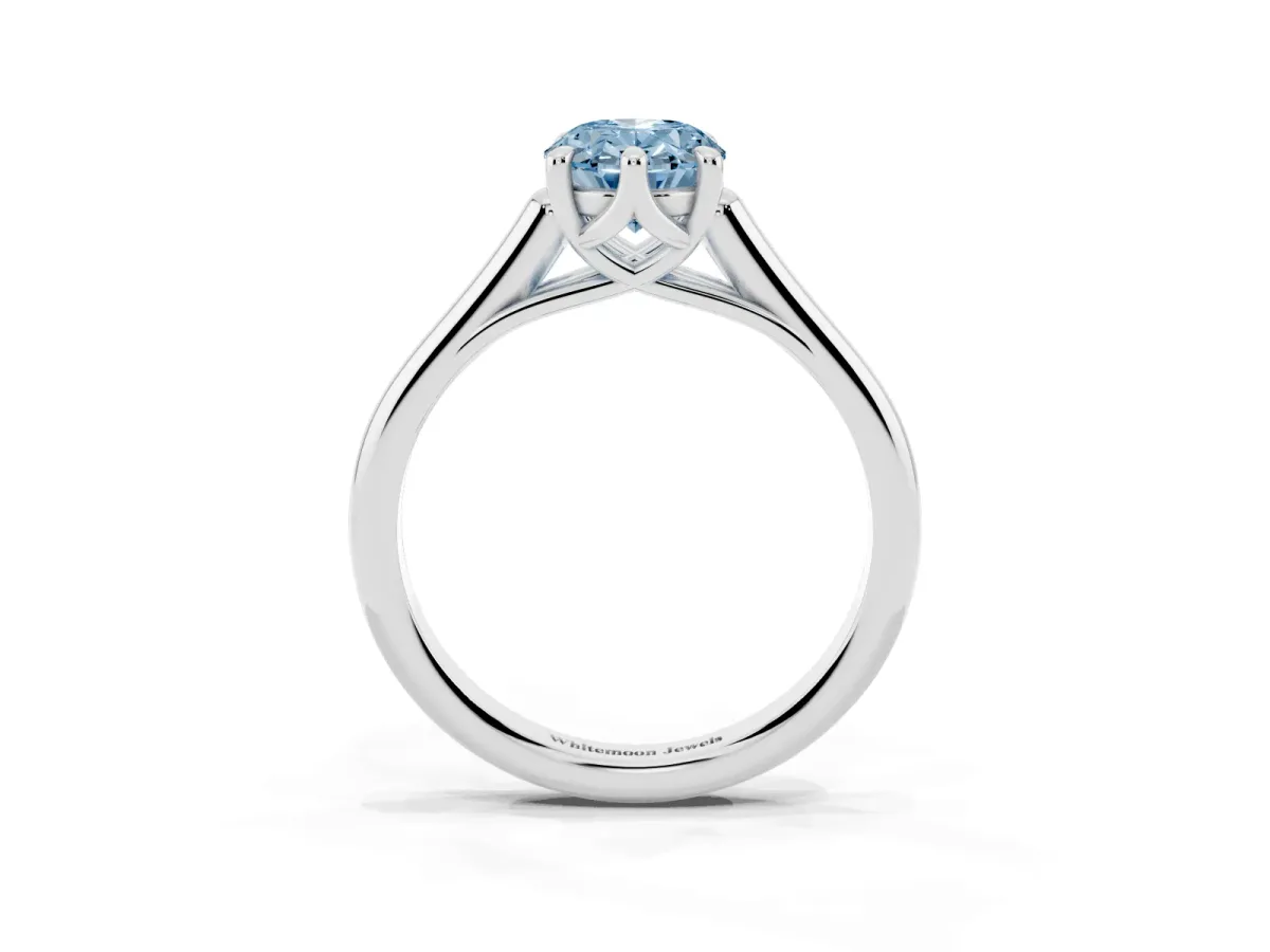 Fancy Blue Oval Cut Solitaire Engagement Ring with Six-Prong Setting and Classic Band Silver