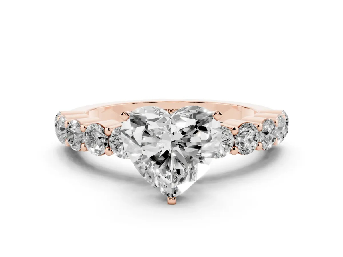 Heart Cut Diamond Solitaire Ring with Shared Prong Round Side Stones Rose gold