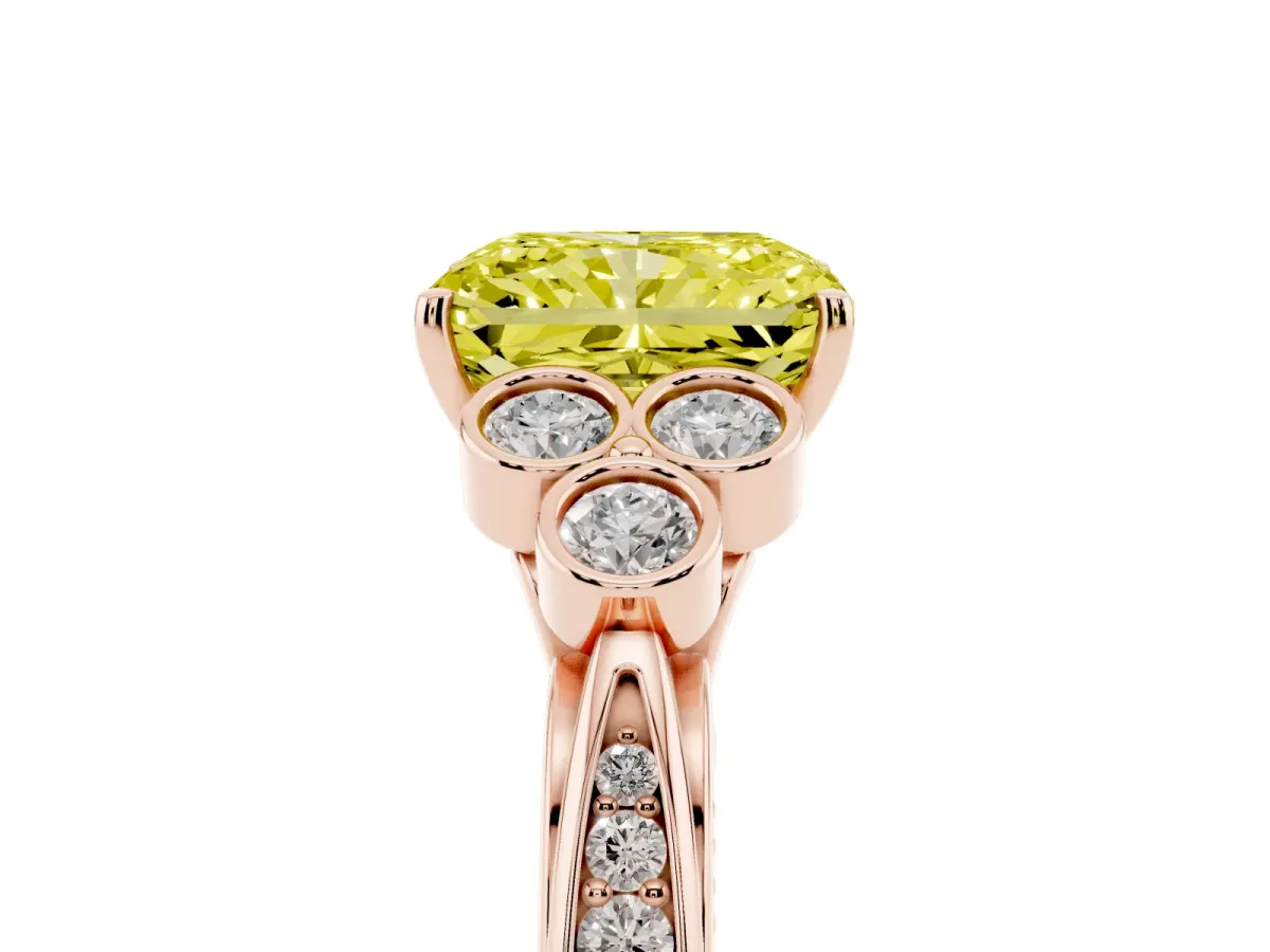 Fancy Yellow Radiant Cut Cut Diamond Engagement Ring with Bezel Set Round Side Stones and Prong Setting Rose gold