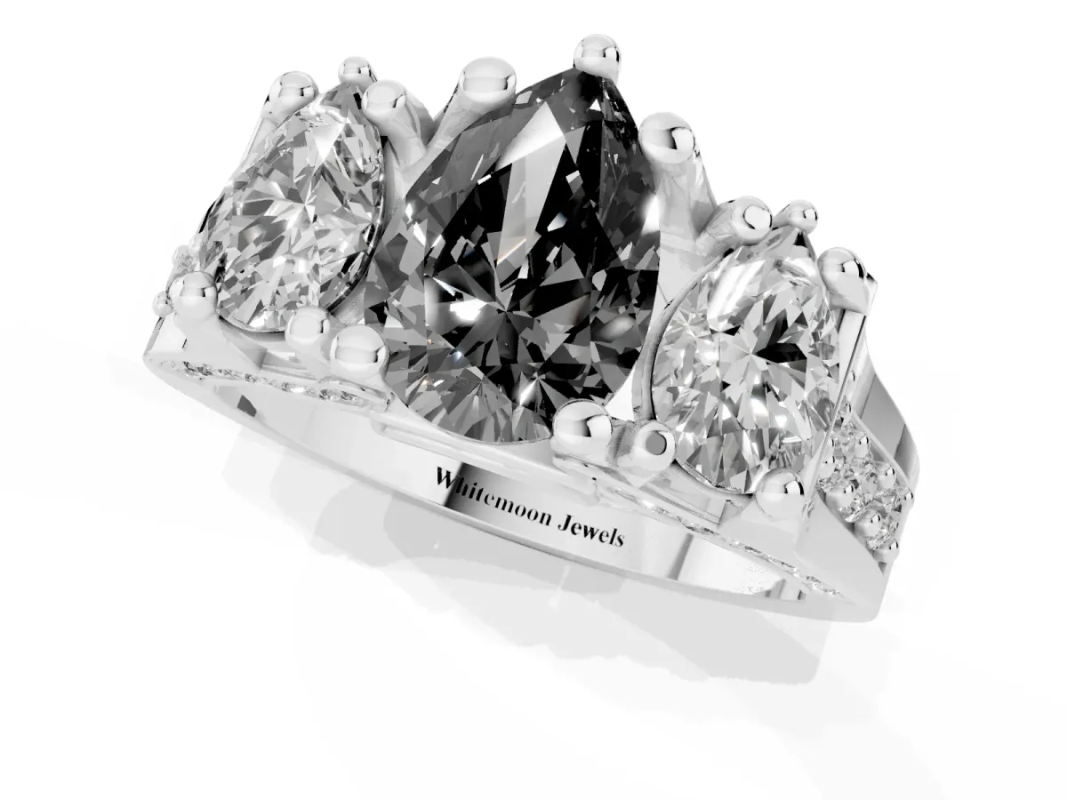 Fancy Black Pear Cut Diamond Three-Stone Ring with Channel Set Band and Four-Prong Setting Silver