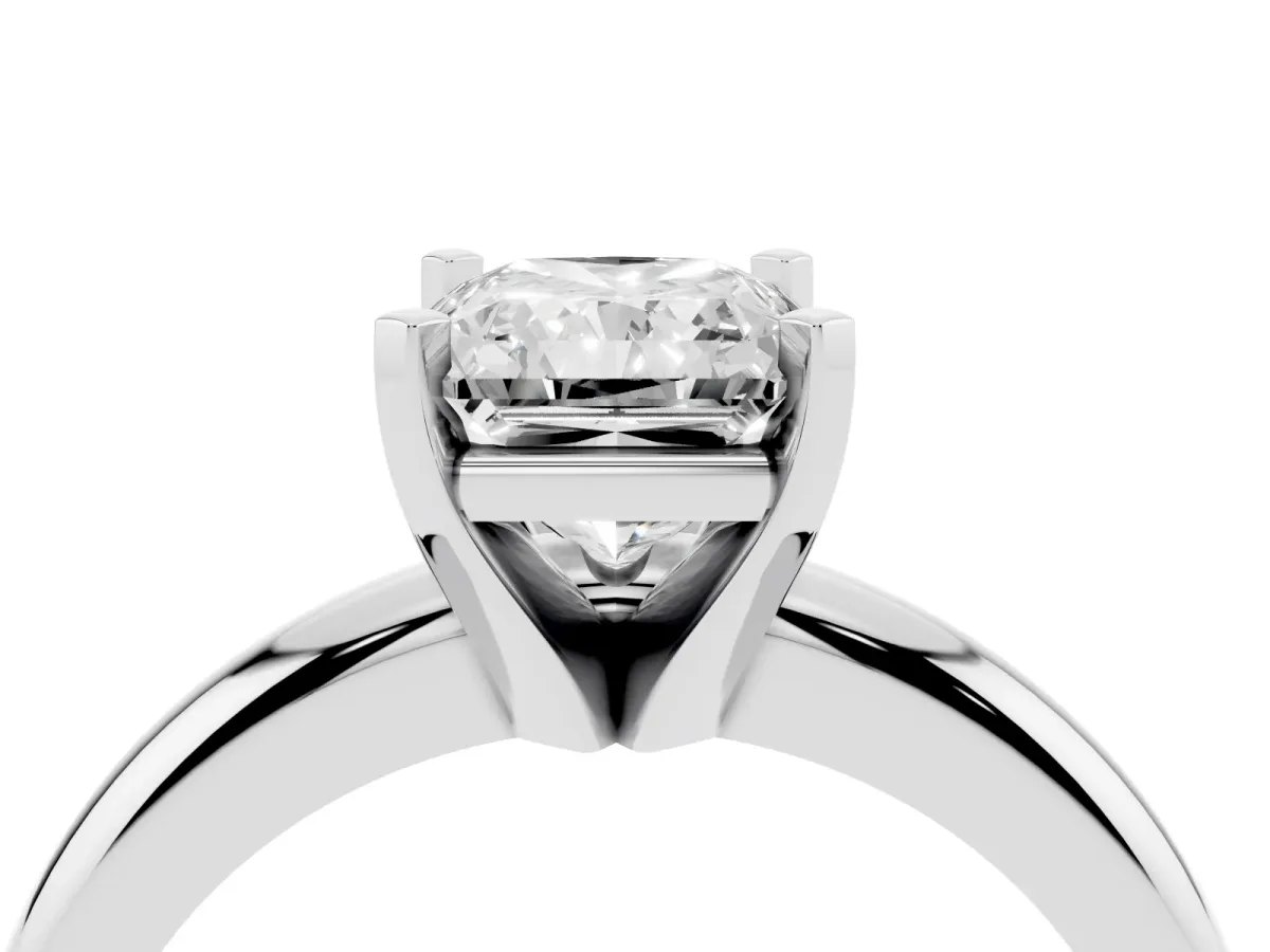 Radiant Cut Diamond Solitaire Engagement Ring with Round Band and Four-Prong Setting Silver