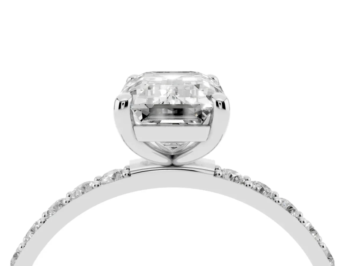 Emerald Cut Diamond Solitaire Ring with Round Pavé Band and Prong Setting Platinum