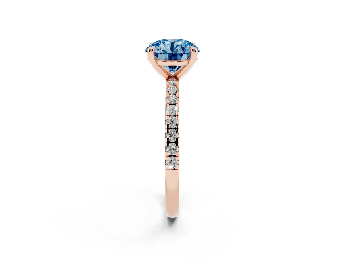 Fancy Blue Round Cut Diamond Brilliant Solitaire Ring with Pavé Band and Four-Prong Setting Rose gold