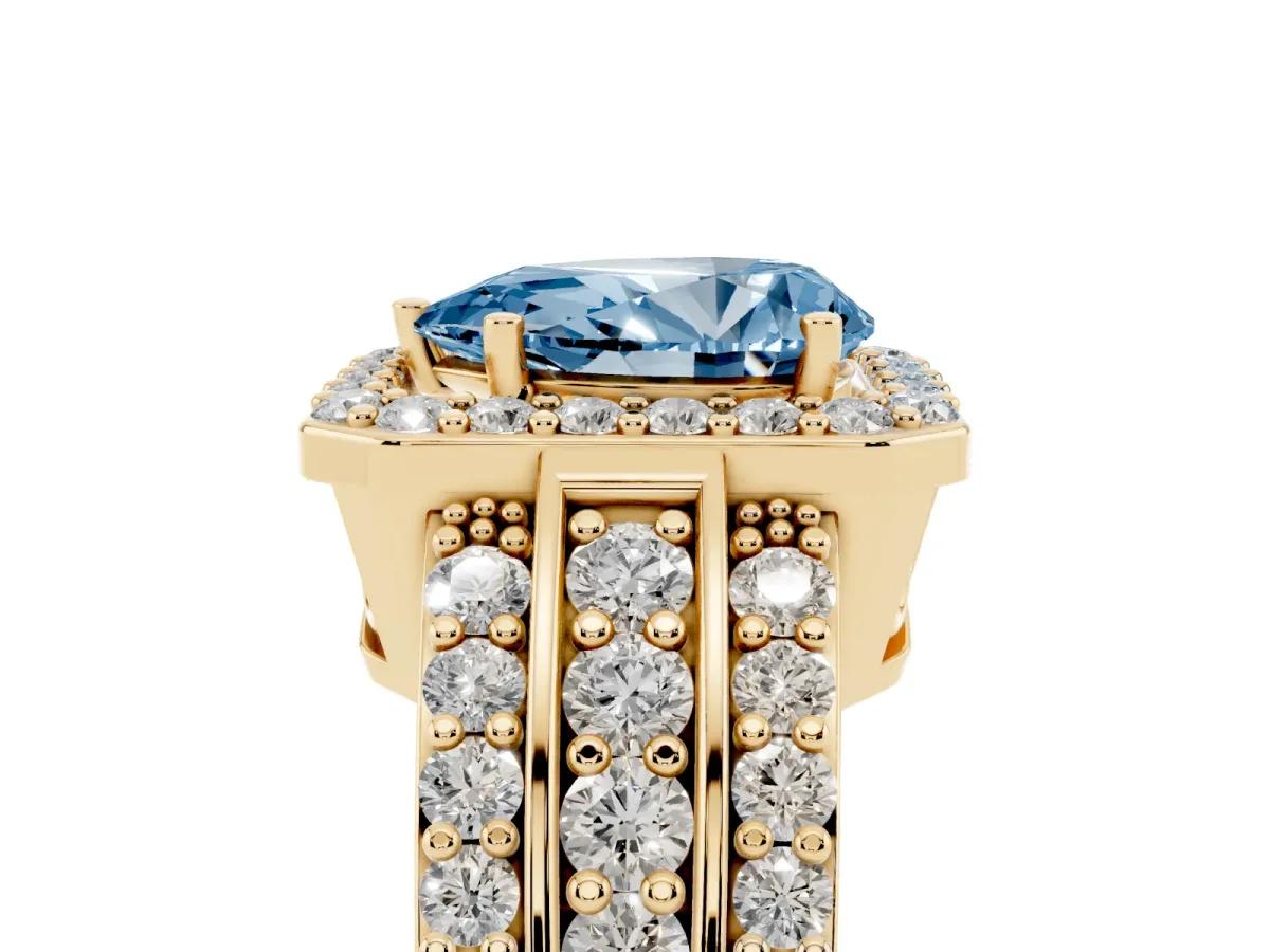 Fancy Blue Pear Cut Halo Diamond Ring with Round Split Shank and Prong Setting Yellow gold
