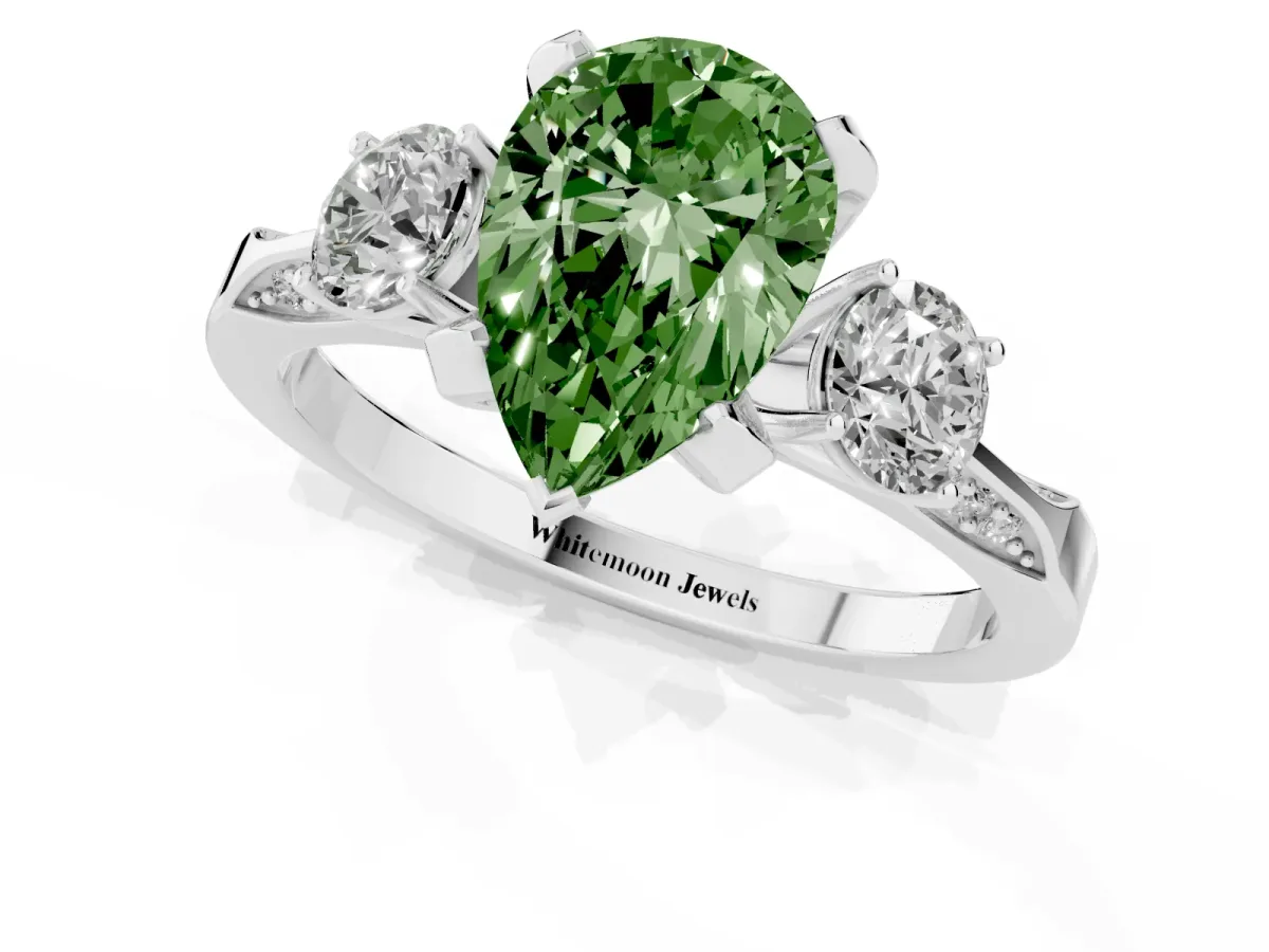 Fancy Green Pear Cut Brilliant Three-Stone Diamond Ring with Pavé Band and Four-Prong Setting Silver