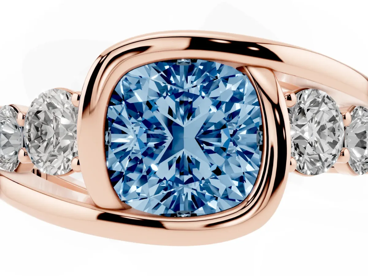 Fancy Blue Bezel Set Cushion Cut Diamond Bypass Ring with Round Accents Rose gold