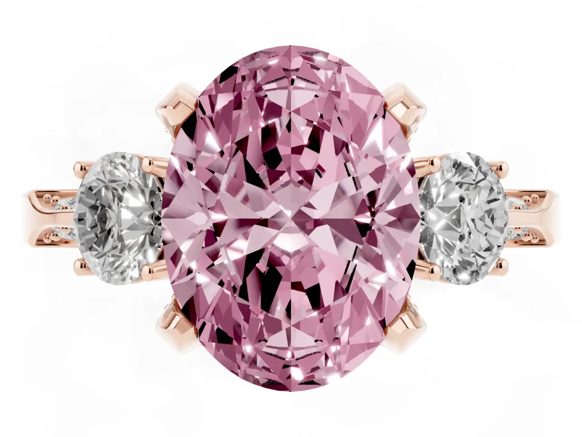 Fancy Pink Oval Cut Brilliant Three-Stone Diamond Ring with Pavé Band and Four-Prong Setting Rose gold