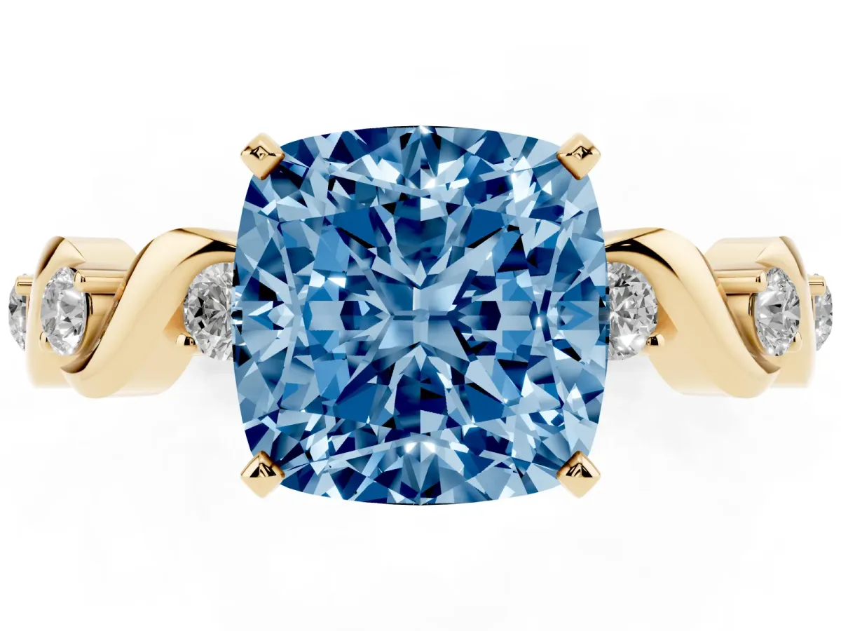 Fancy Blue Cushion Cut Diamond Solitaire Twisted Band with Round Accents and Prong Setting Yellow gold