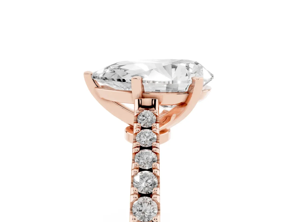 Pear Cut Cut Solitaire Diamond Engagement Ring with Pave Band and Four-Prong Setting Rose gold