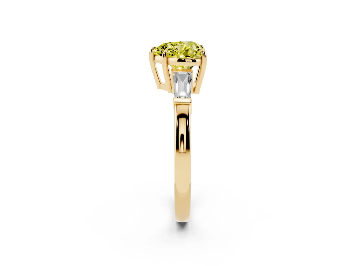Fancy Yellow Heart Cut Diamond Three-Stone Ring with Tapered Baguette Side Stones and Prong Setting Yellow gold