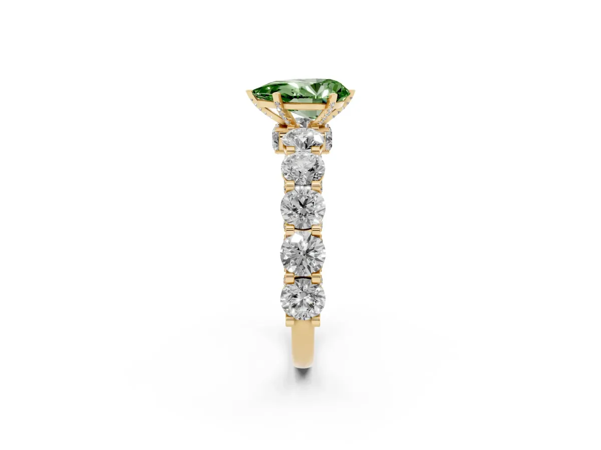 Fancy Green Pear Cut Diamond Side Stone Engagement Ring with Four-Prong Setting Yellow gold