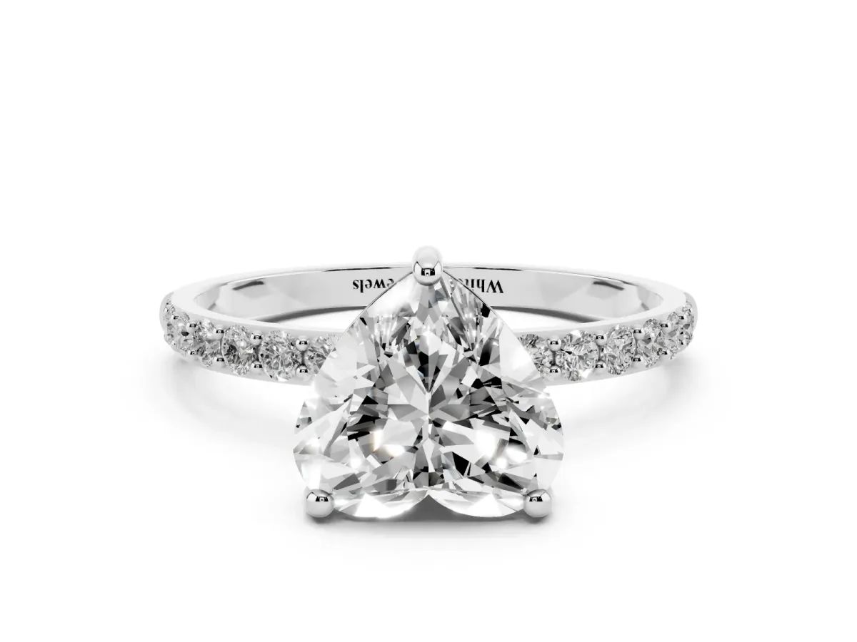 Heart Cut Diamond Solitaire Ring with Round Pavé Band and Prong Setting Silver