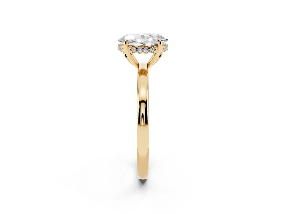 Oval Cut Solitaire Diamond Ring with Prong Setting and Plain Band Yellow gold