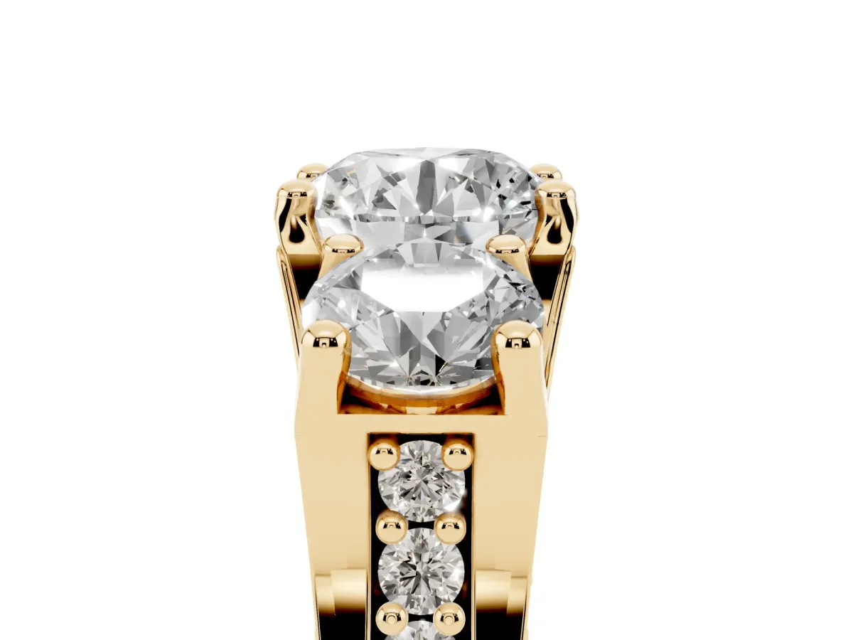 Round Cut Diamond Three-Stone Ring with Channel Set Band and Four-Prong Setting Yellow gold