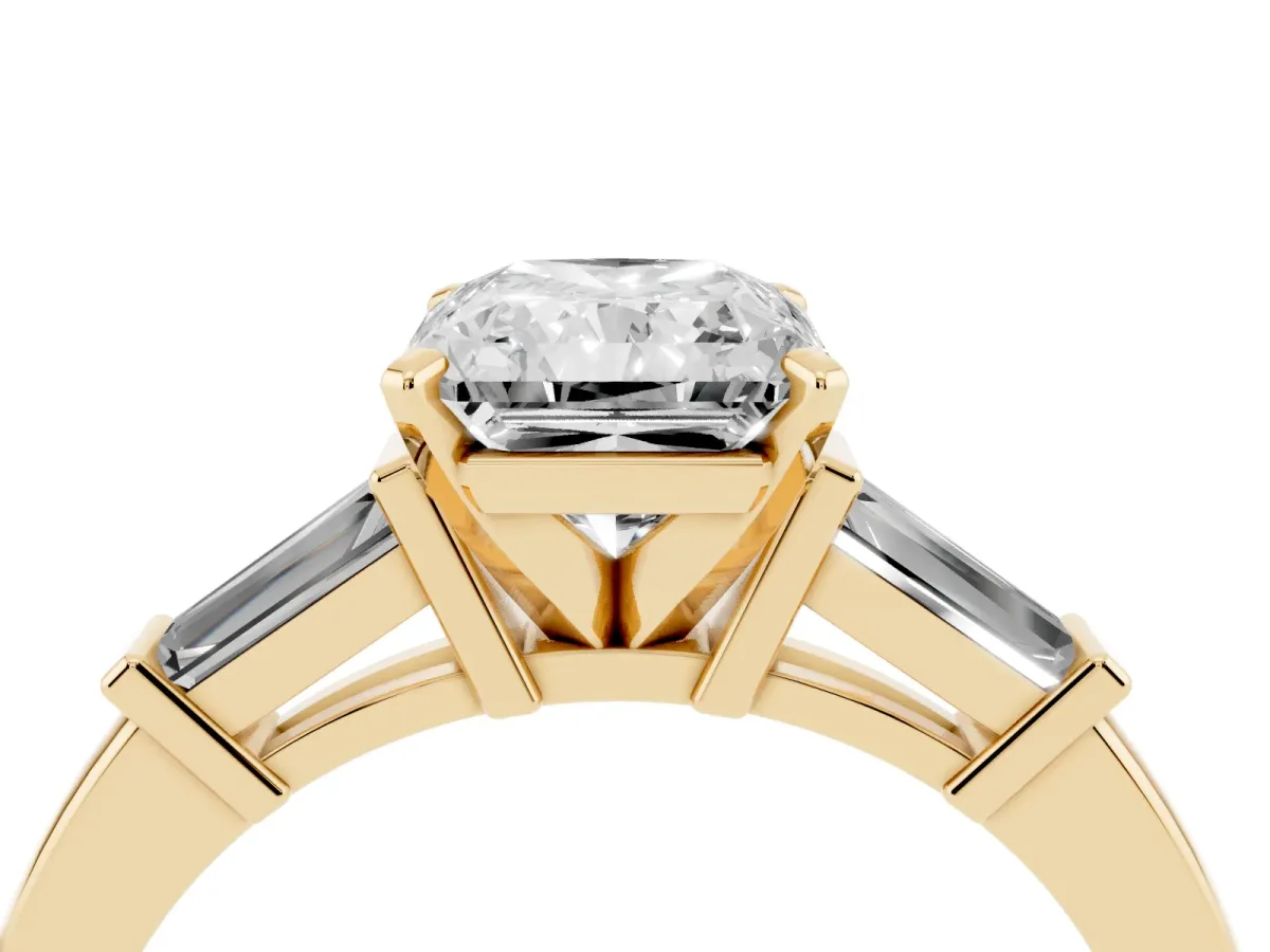 Radiant Cut Cut Diamond Solitaire Ring with Tapered Baguette Accents and Four-Prong Setting Yellow gold
