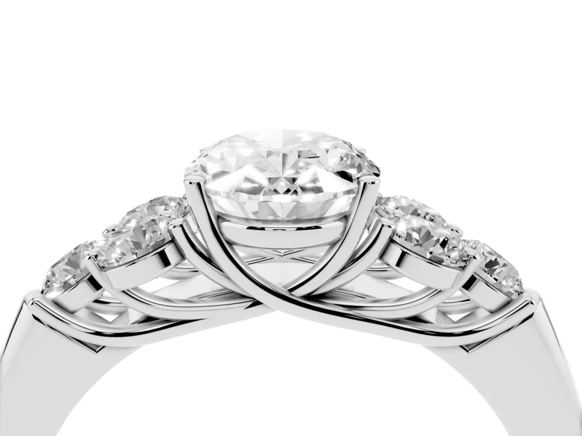 Oval Cut Cut Diamond Cluster Ring with Round Accent Stones and Prong Setting on a Classic Band White gold