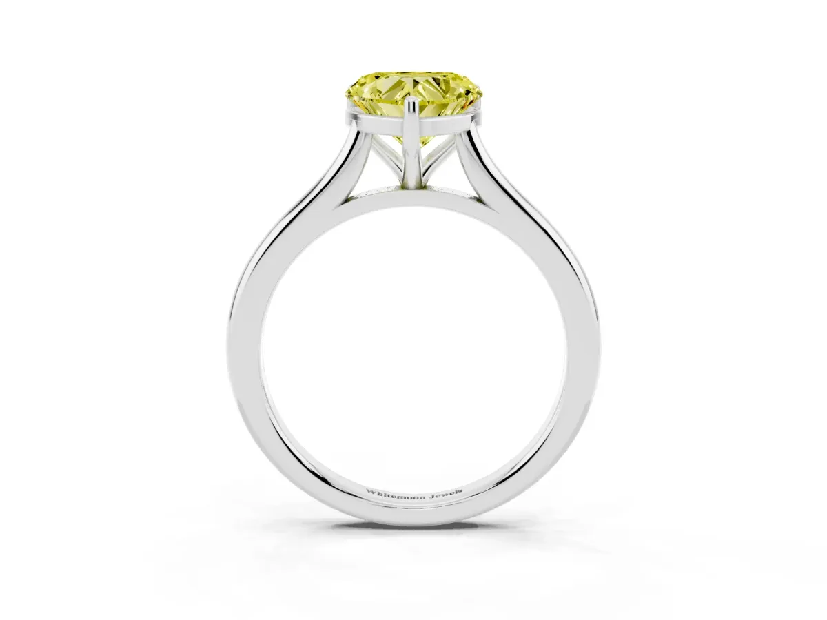 Fancy Yellow Heart Cut Cut Solitaire Ring with Cathedral Band and Four-Prong Setting Silver