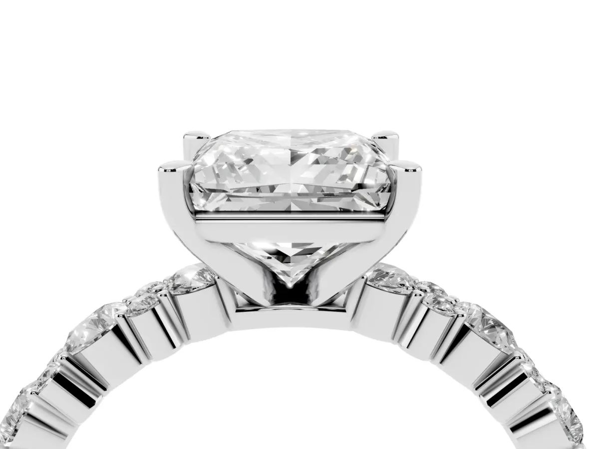 Princess Cut Diamond Side Stone Solitaire Ring with Round and Four-Prong Setting Platinum
