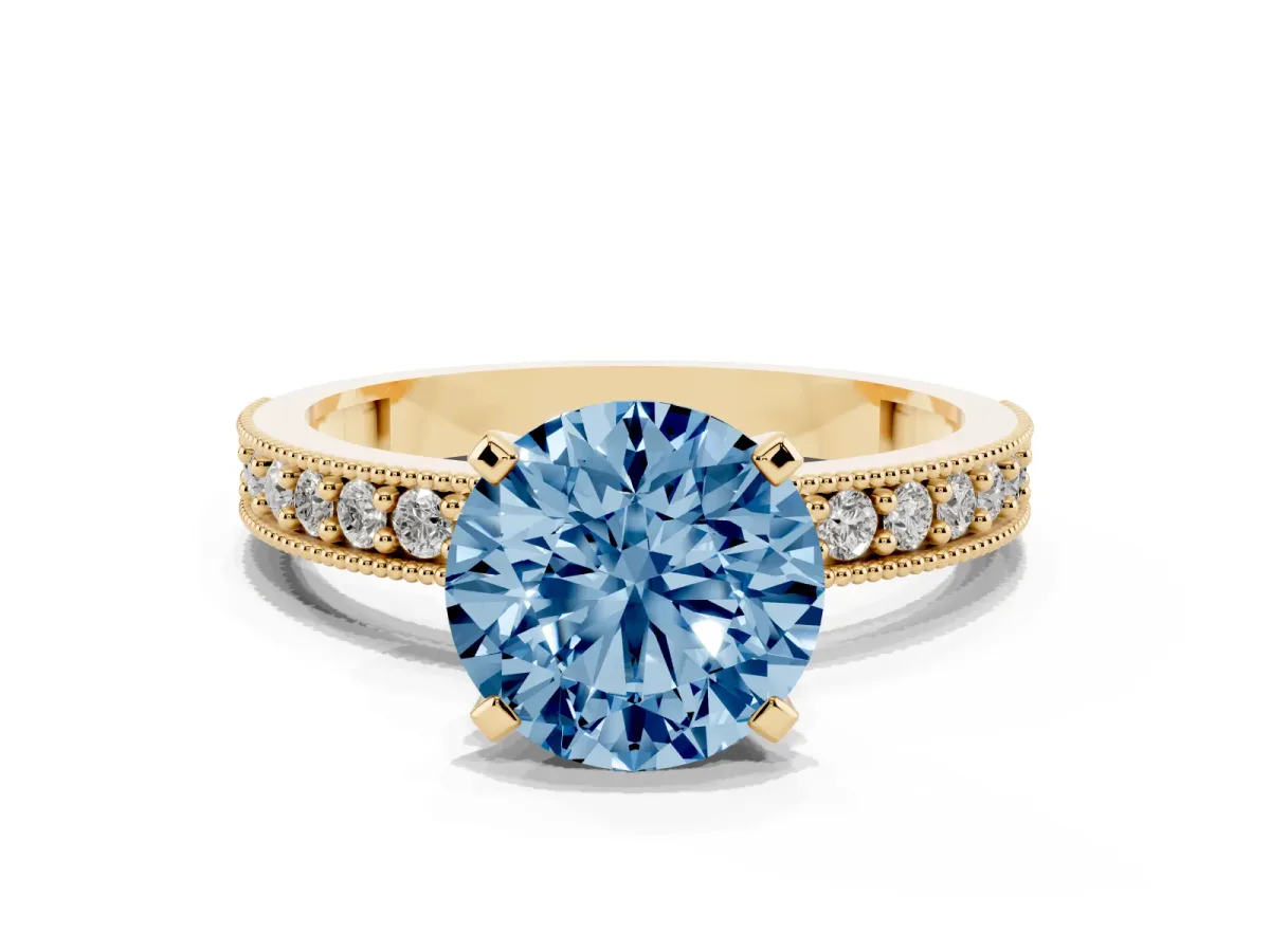 Fancy Blue Round Cut Diamond Milgrain Pavé Engagement Ring with Four-Prong Setting Yellow gold