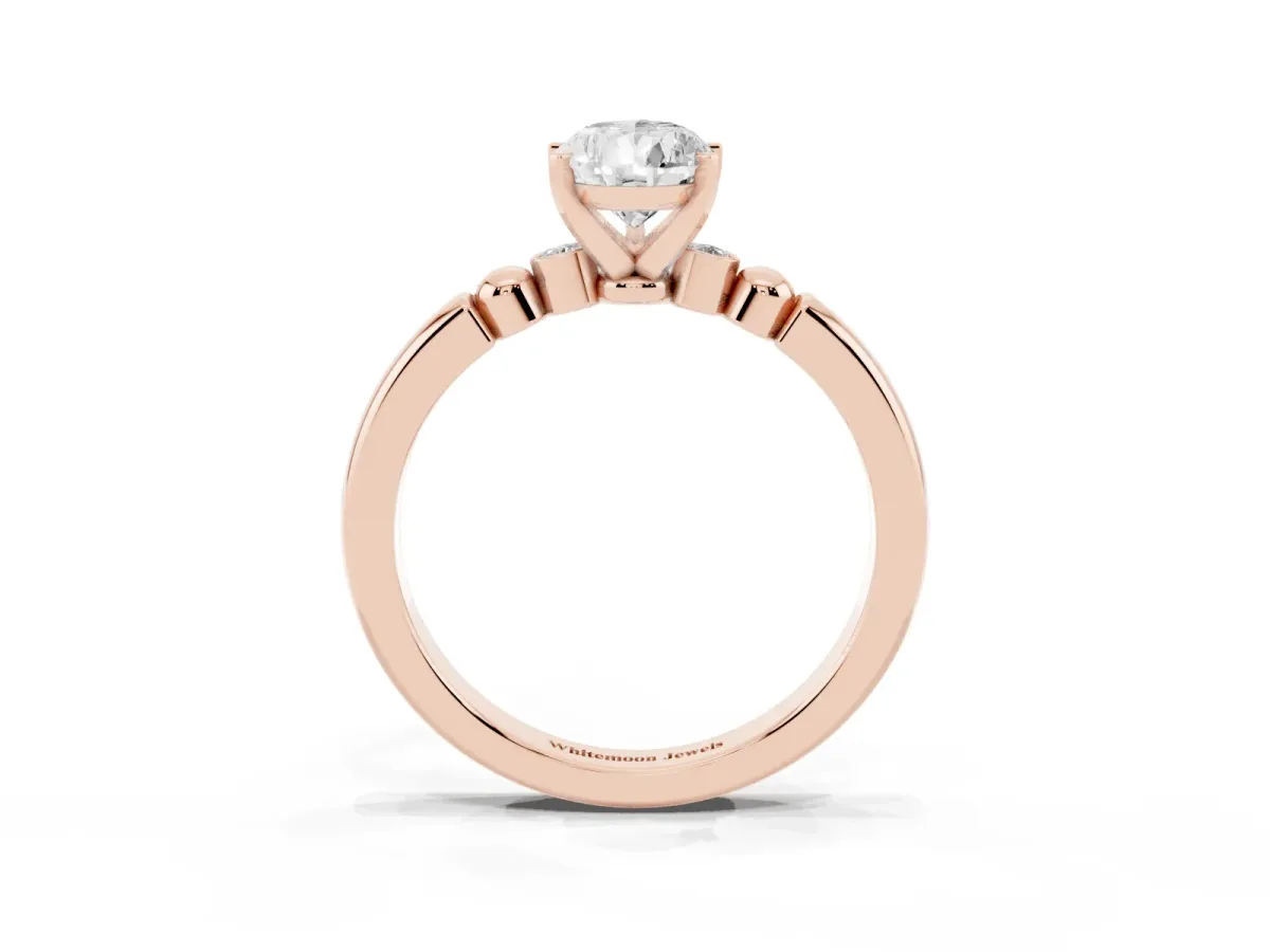 Pear Cut Solitaire Beaded Band with Four-Prong Setting Rose gold