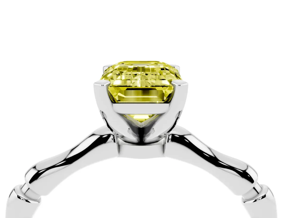 Fancy Yellow Emerald Cut Solitaire Diamond Ring with Bamboo Band and Four-Prong Setting Silver