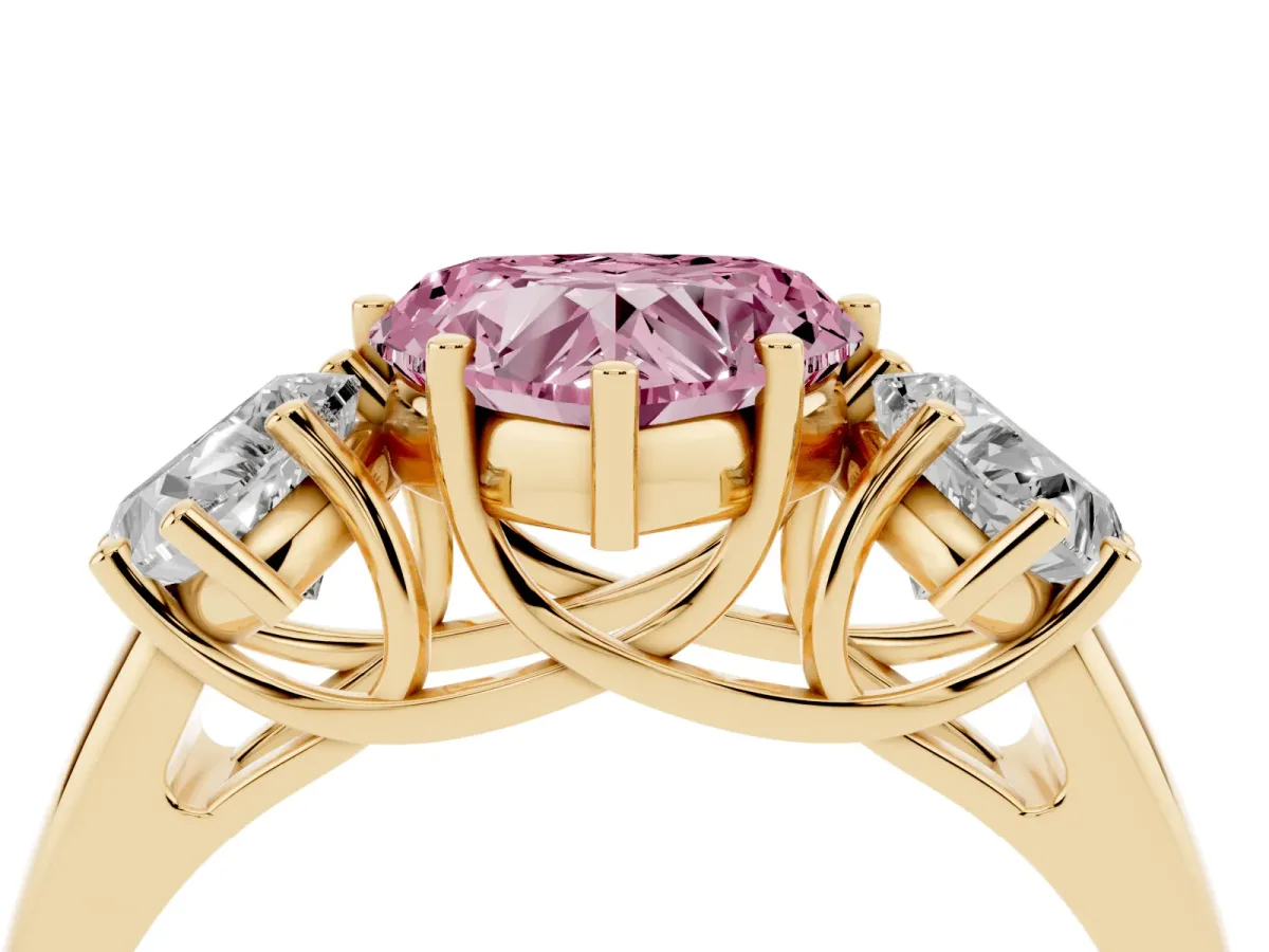 Fancy Pink Three-Stone Heart Cut Diamond Engagement Ring with Prong Setting Yellow gold