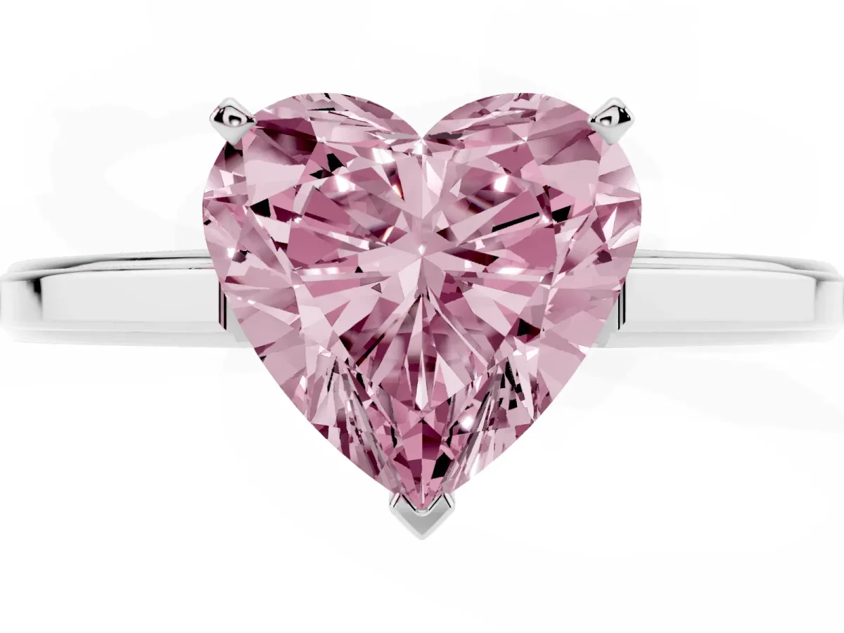 Fancy Pink Heart Cut Solitaire Diamond Ring with Four-Prong Setting and Classic Band Silver
