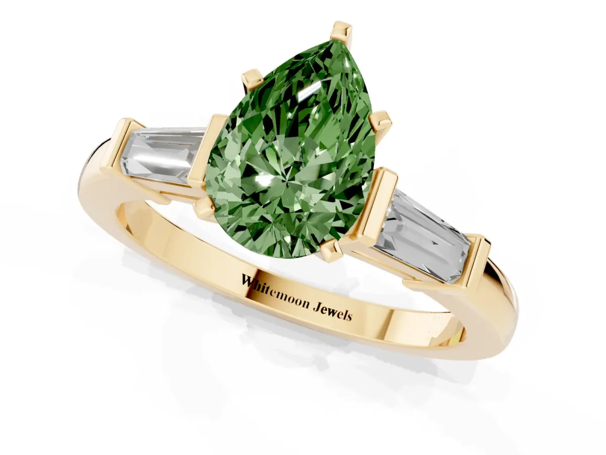 Fancy Green Pear Cut Cut Diamond Solitaire Ring with Tapered Baguette Accents and Four-Prong Setting Yellow gold