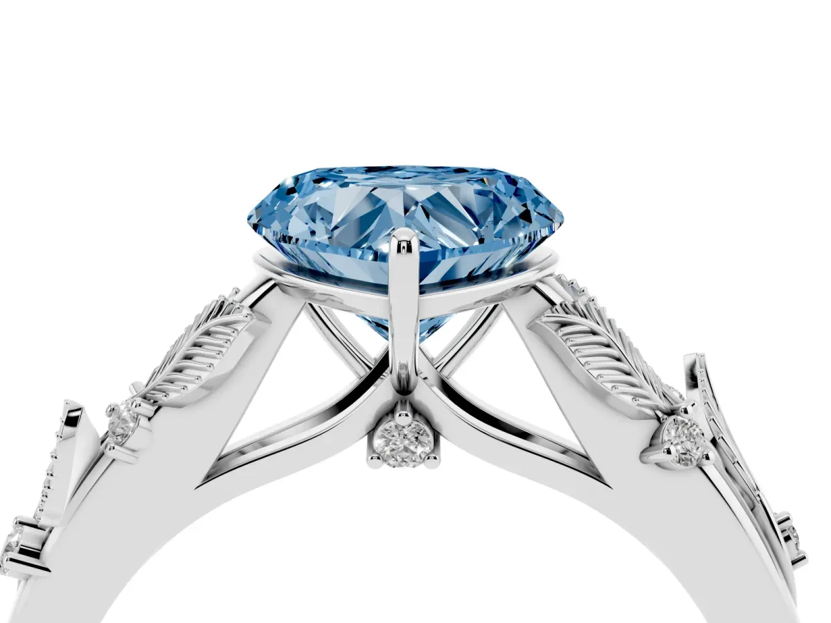 Fancy Blue Heart Cut Diamond Solitaire Ring with Leaf Motif Band and Four-Prong Setting Platinum