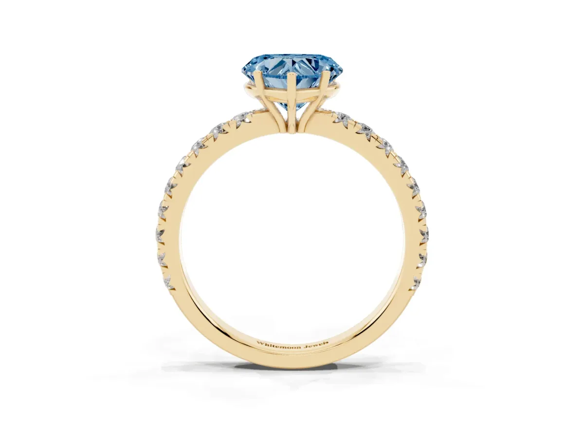Fancy Blue Heart Cut Diamond Pavé Solitaire Engagement Ring with Four-Prong Setting Yellow gold