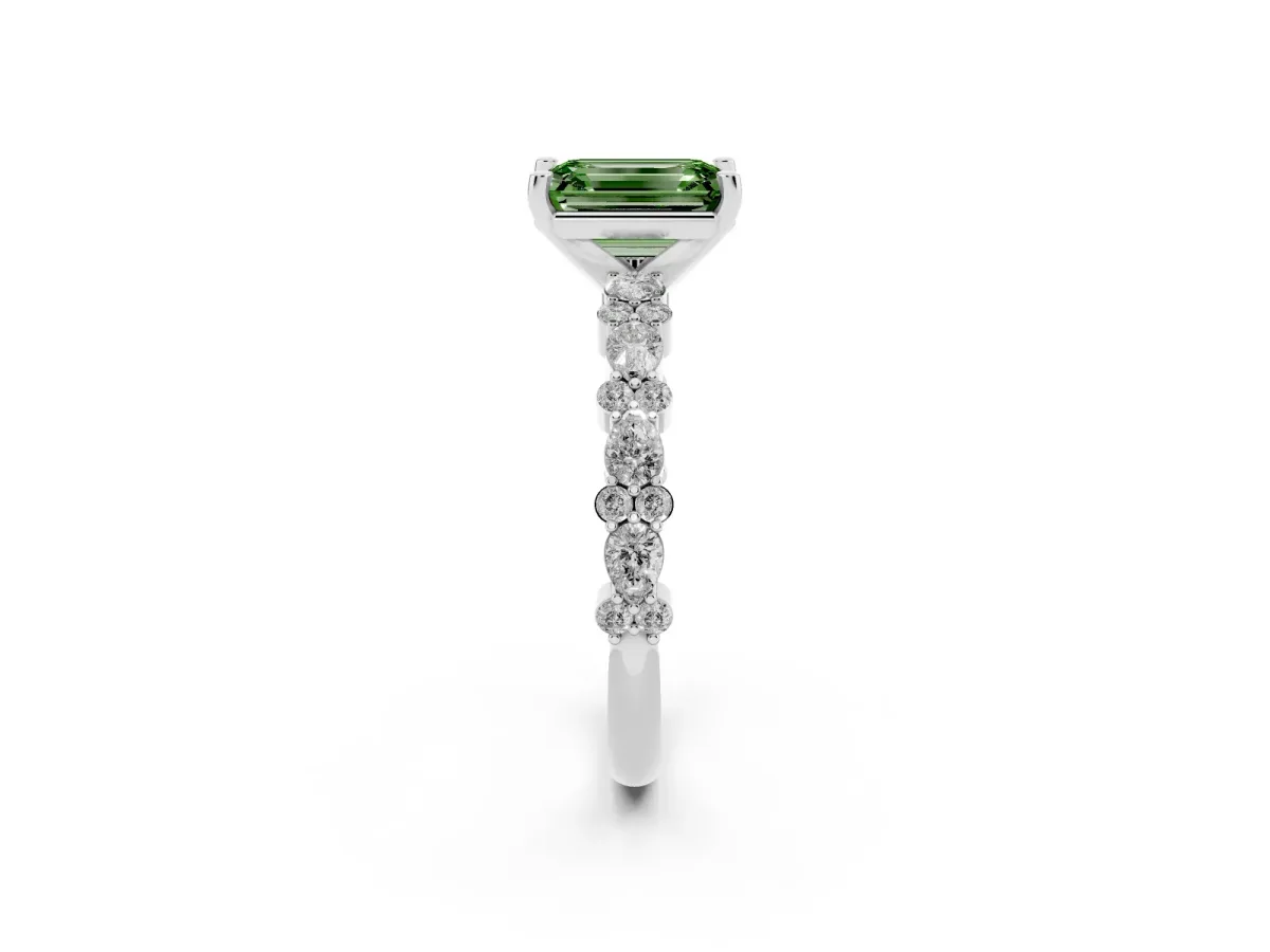 Fancy Green Emerald Cut Diamond Side Stone Solitaire Ring with Round and Four-Prong Setting Silver