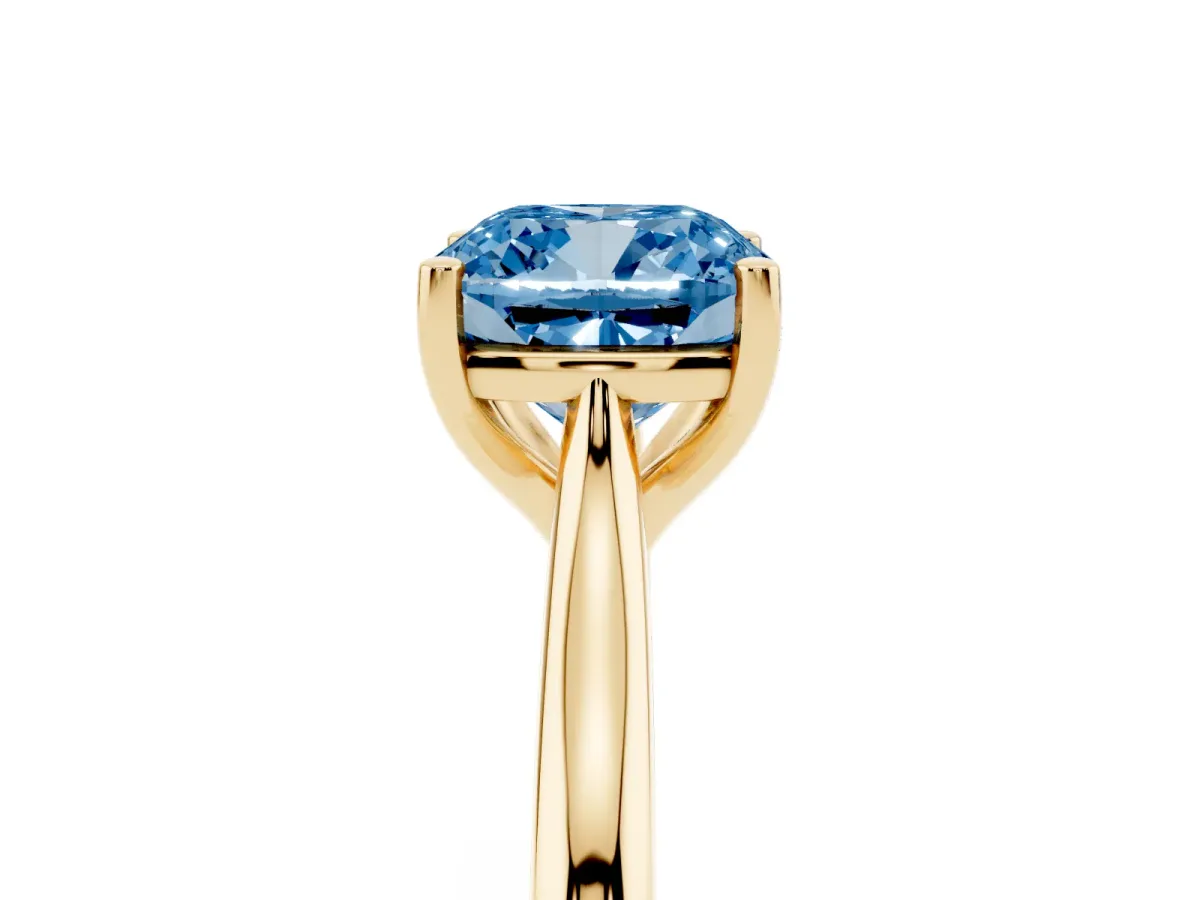 Fancy Blue Cushion Cut Cut Solitaire Ring with Cathedral Band and Four-Prong Setting Yellow gold
