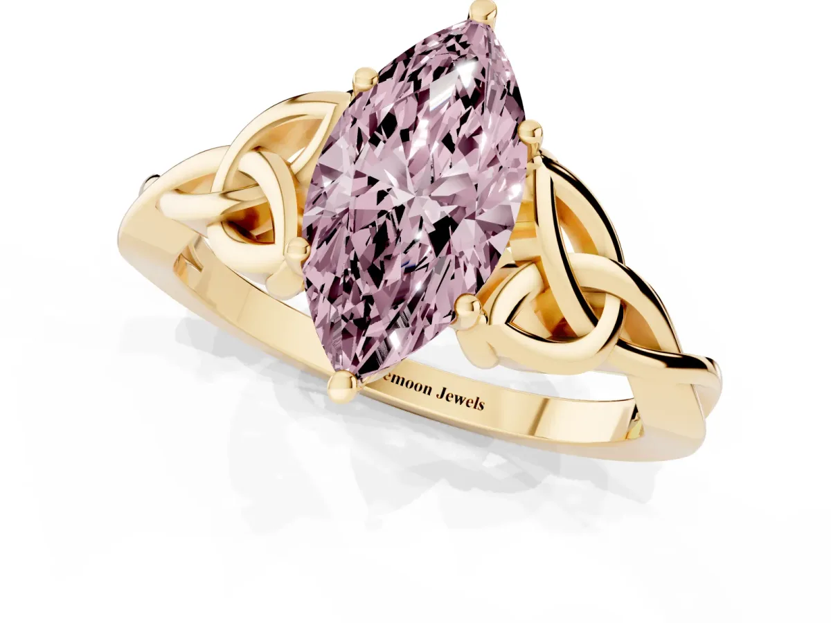 Fancy Pink Marquise Cut Diamond Solitaire Engagement Ring with Celtic Knot Band and Four-Prong Setting Yellow gold
