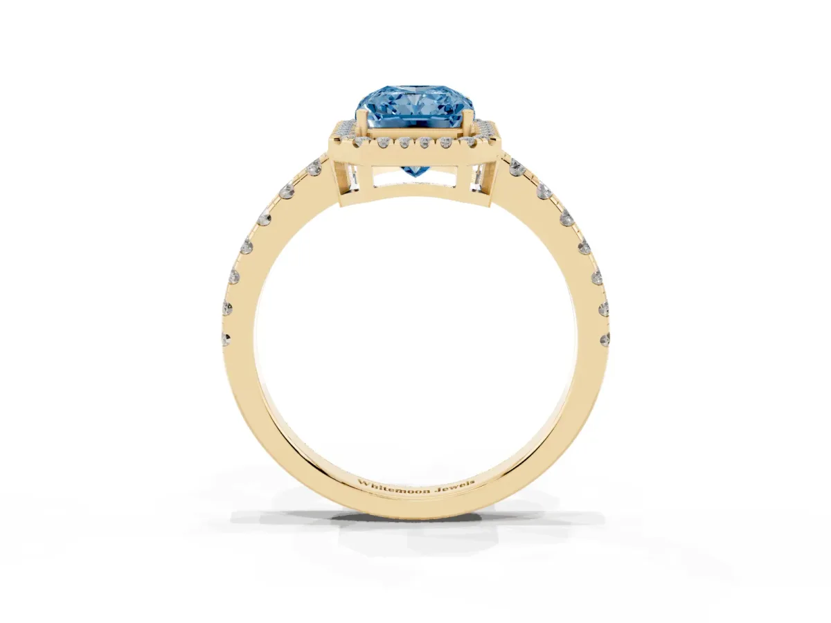 Fancy Blue Radiant Cut Diamond Halo Ring with Pavé Band and Four-Prong Setting Yellow gold