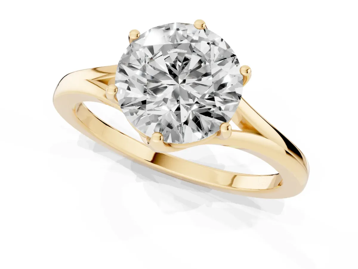 Round Cut Solitaire Diamond Ring with Six-Prong Setting and Tapered Band Yellow gold