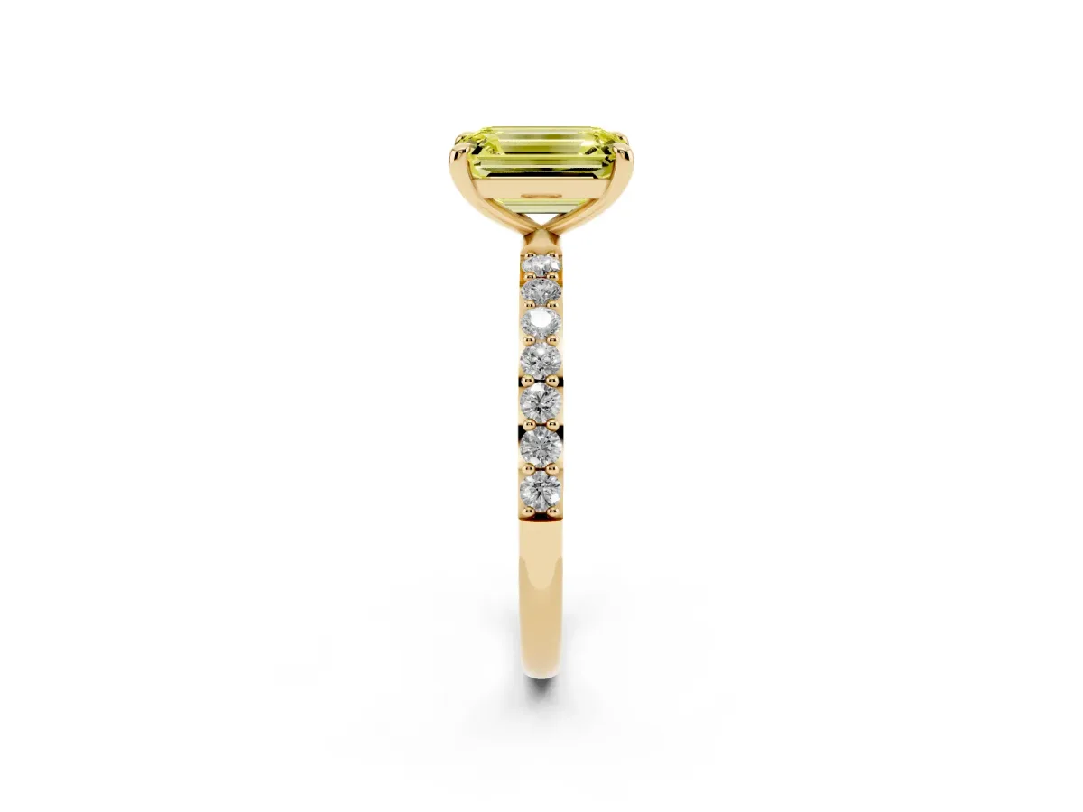 Fancy Yellow Emerald Cut Diamond Solitaire Ring with Round Pavé Band and Prong Setting Yellow gold