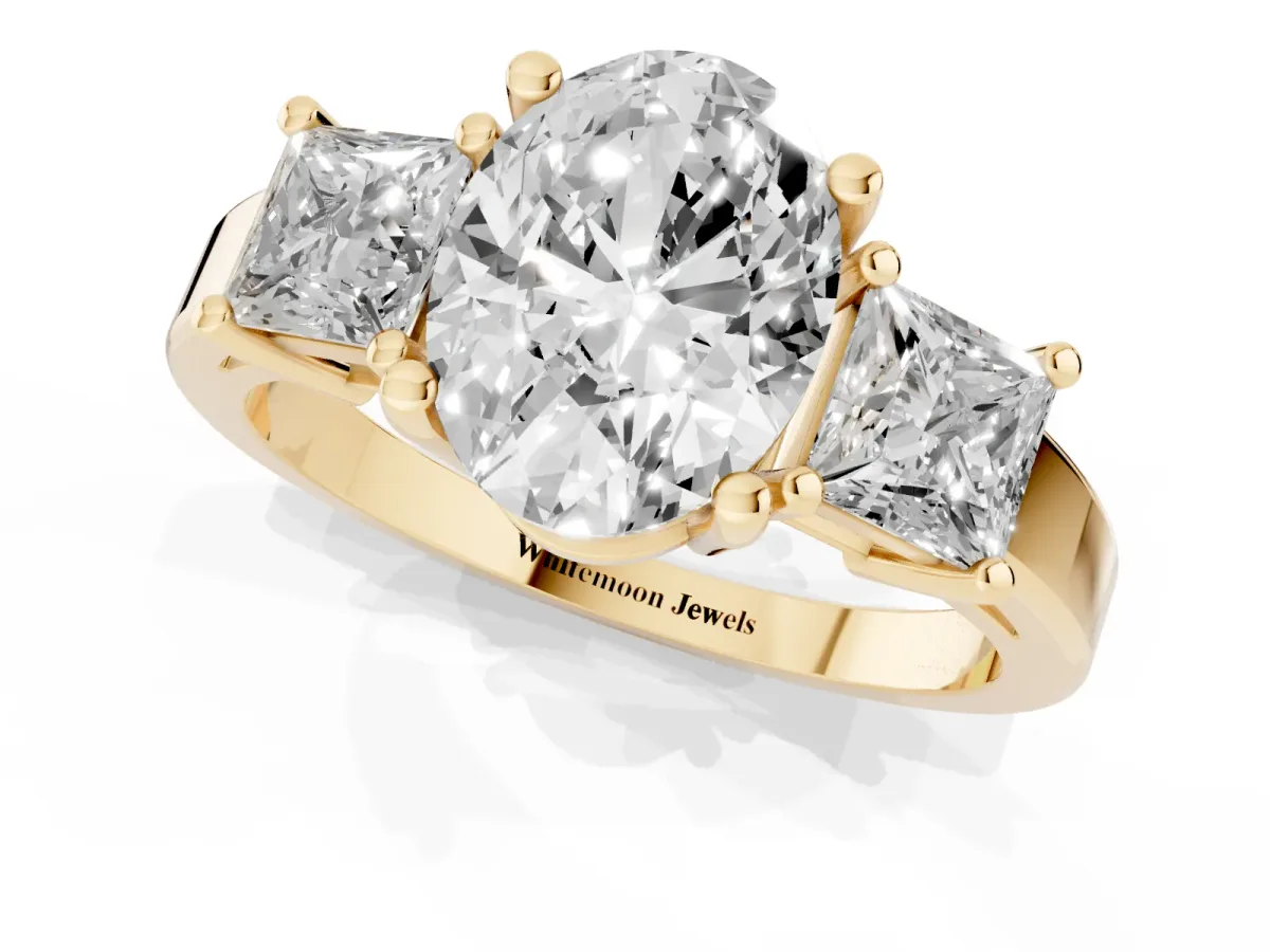 Three-Stone Oval Cut Cut Solitaire Ring with Prong Setting Yellow gold